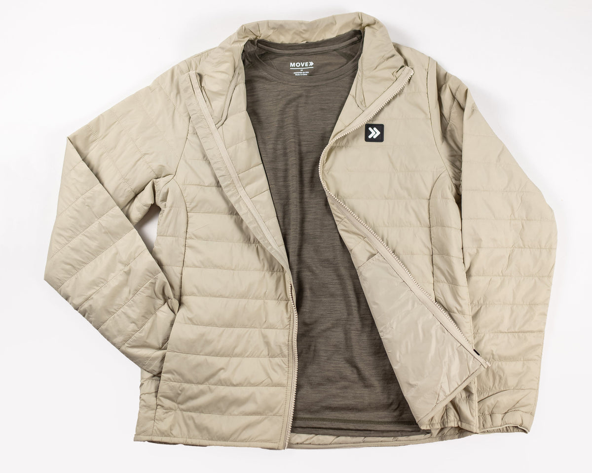 MOVE sport apparel women's lightweight beige quilted down jacket with a full-length zipper and high-neck design.