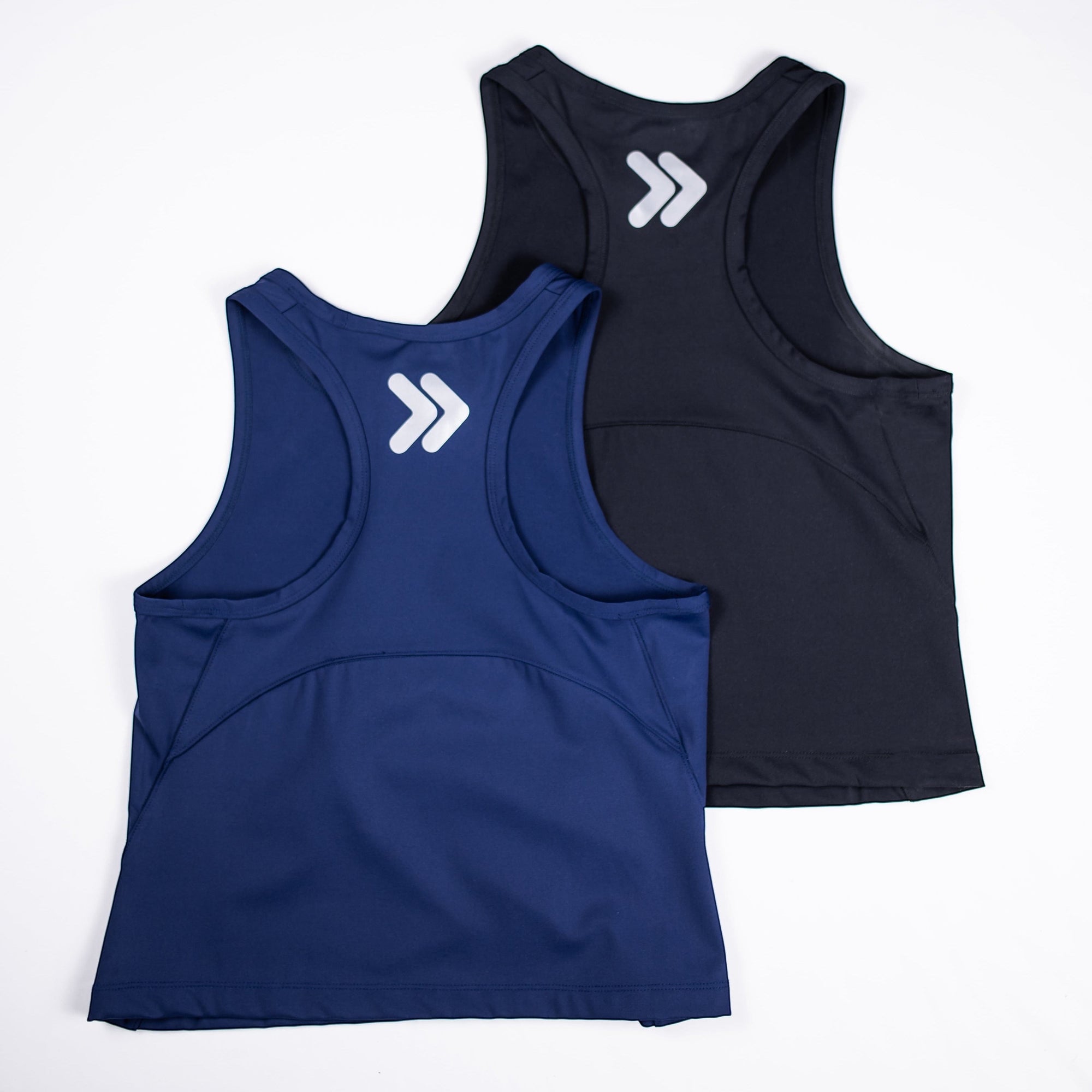 MOVE sport apparel women's cropped tank tops in navy and black with racerback design and reflective logo detail.