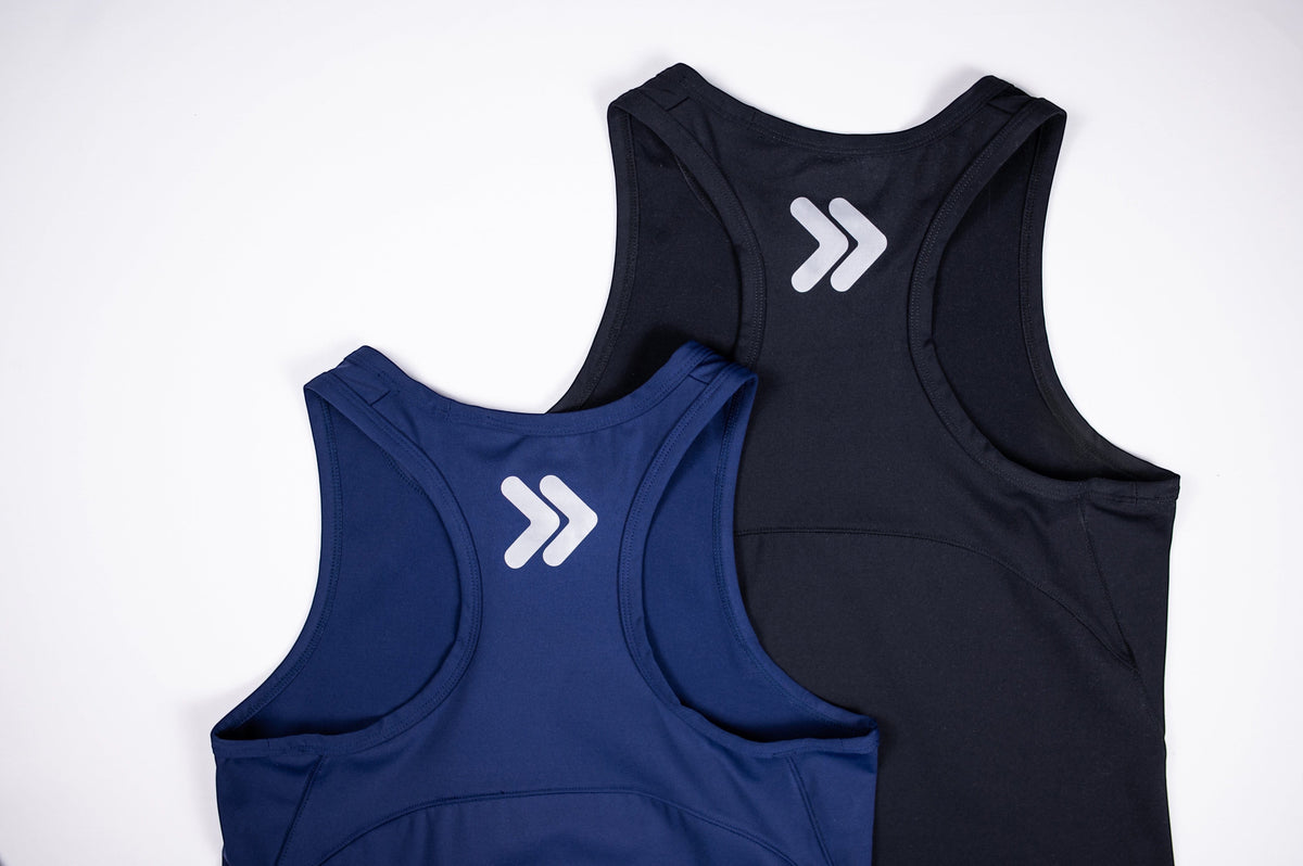 MOVE sport apparel women's cropped racerback tanks in navy and black with white logo detail on the back