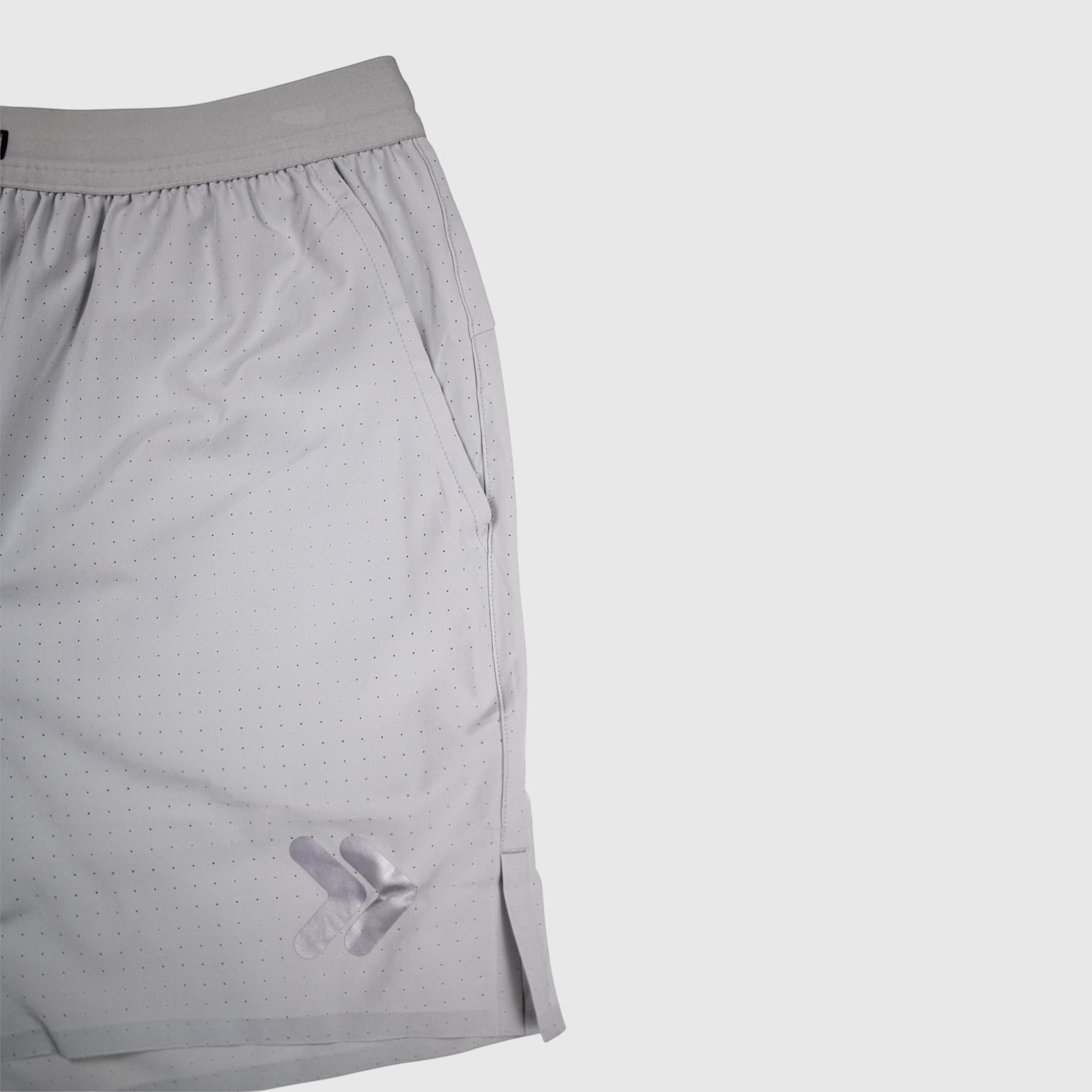 MOVE sport apparel Agility 6 inch training shorts in light grey with perforated fabric and side slit detail