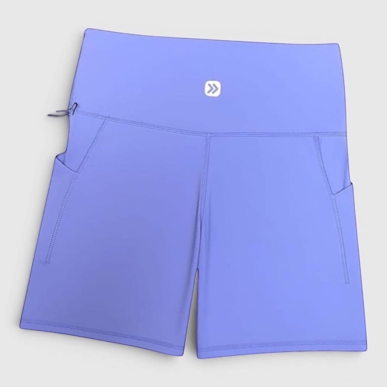 MOVE sport apparel high-rise athletic shorts in light purple with side pockets and a moisture-wicking fabric finish.