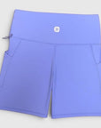 MOVE sport apparel high-rise athletic shorts in light purple with side pockets and a moisture-wicking fabric finish.