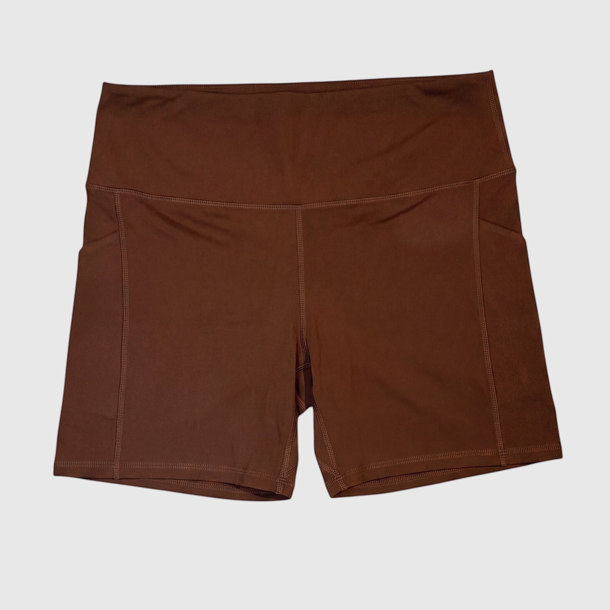 MOVE sport apparel high-rise athletic shorts in dark brown with side pockets and a white 3M logo on the hip