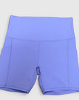 MOVE sport apparel high-rise athletic shorts in periwinkle blue with side pockets and moisture-wicking fabric.