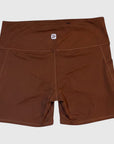 MOVE sport apparel women's brown high-rise athletic shorts with side pockets and moisture-wicking fabric