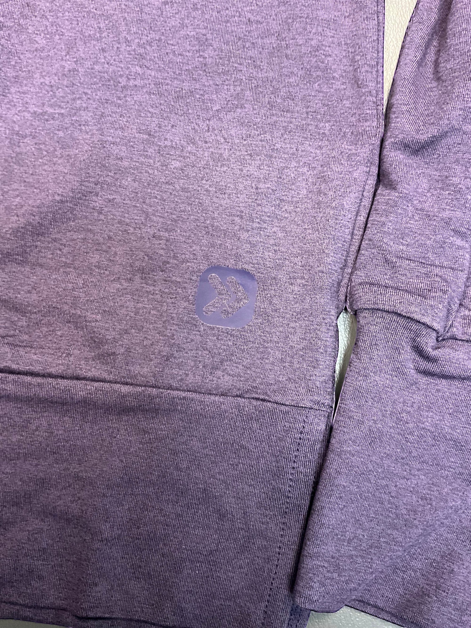 MOVE sport apparel women's long sleeve crewneck pullover in a muted purple heathered fabric with subtle logo detail