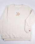 Cream MOVE Sport Apparel Logo Sweatshirt front view with blush-pink double-chevron centered on the chest and original red-and-white sleeve cuff tab.