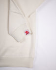 Cream MOVE Sport Apparel Logo Sweatshirt sleeve and cuff detail.