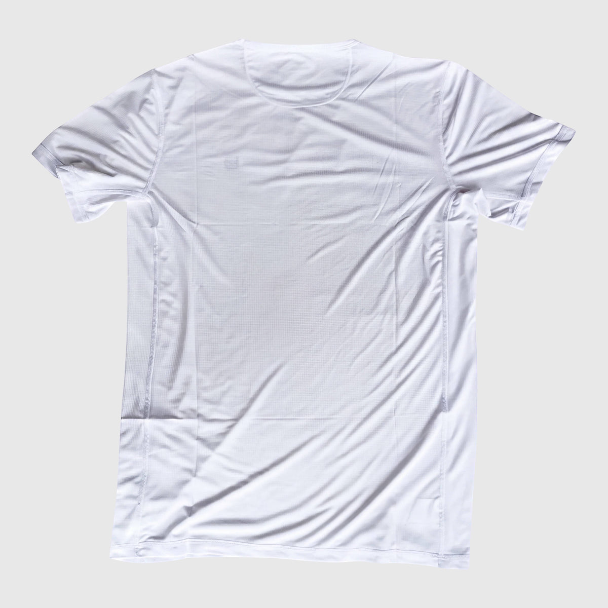 MOVE Sport Apparel Blaze Training T-Shirt in White, back product view.