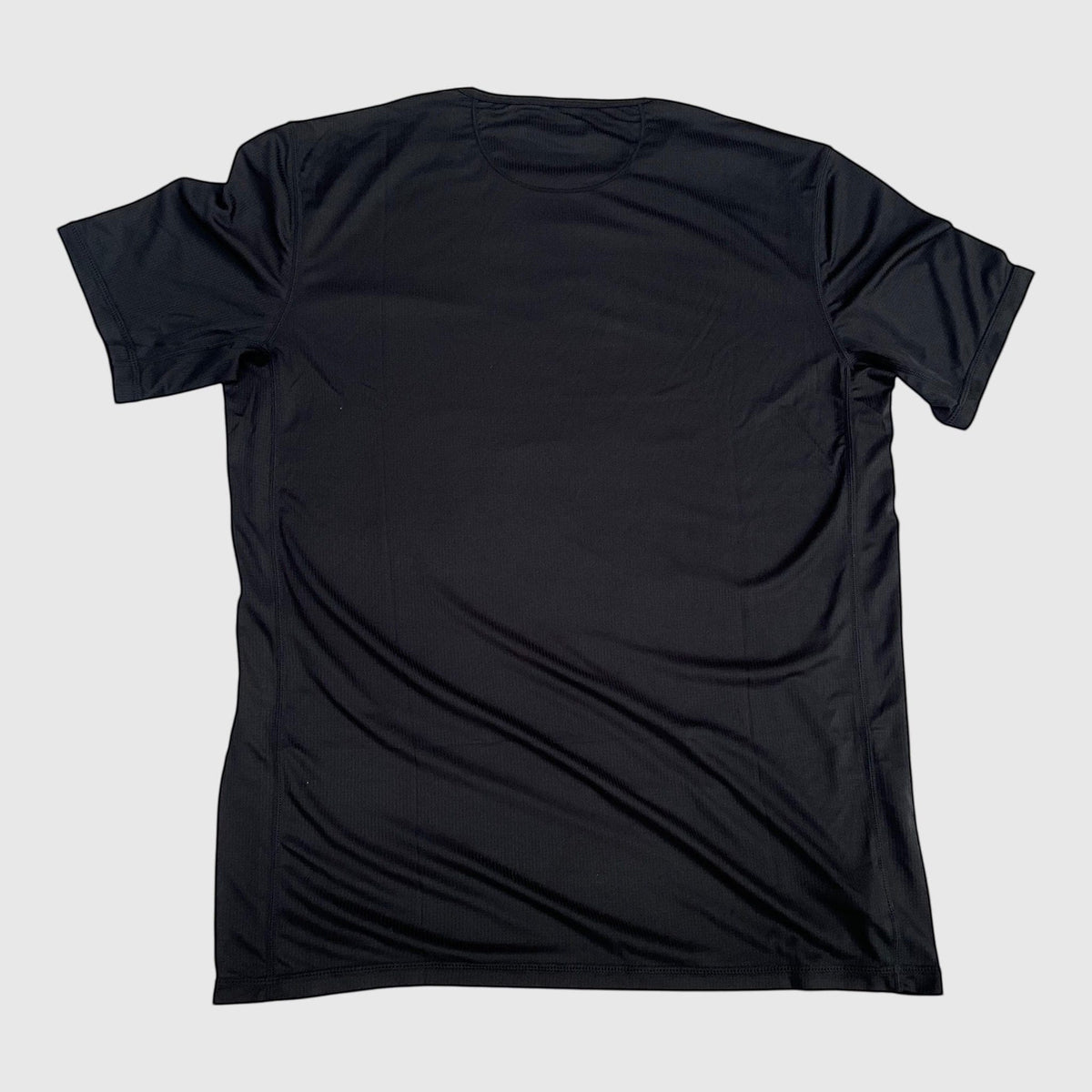MOVE Sport Apparel Blaze Training T-Shirt in Black, back product view.