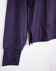 MOVE sport apparel purple long sleeve crewneck sweatshirt with ribbed cuffs and side-slit hem detail