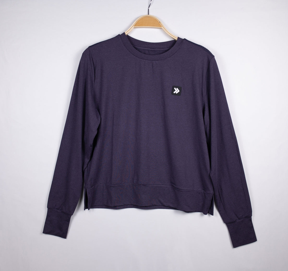 MOVE sport apparel women's dark purple long sleeve crewneck sweatshirt with ribbed cuffs and side-slit hem