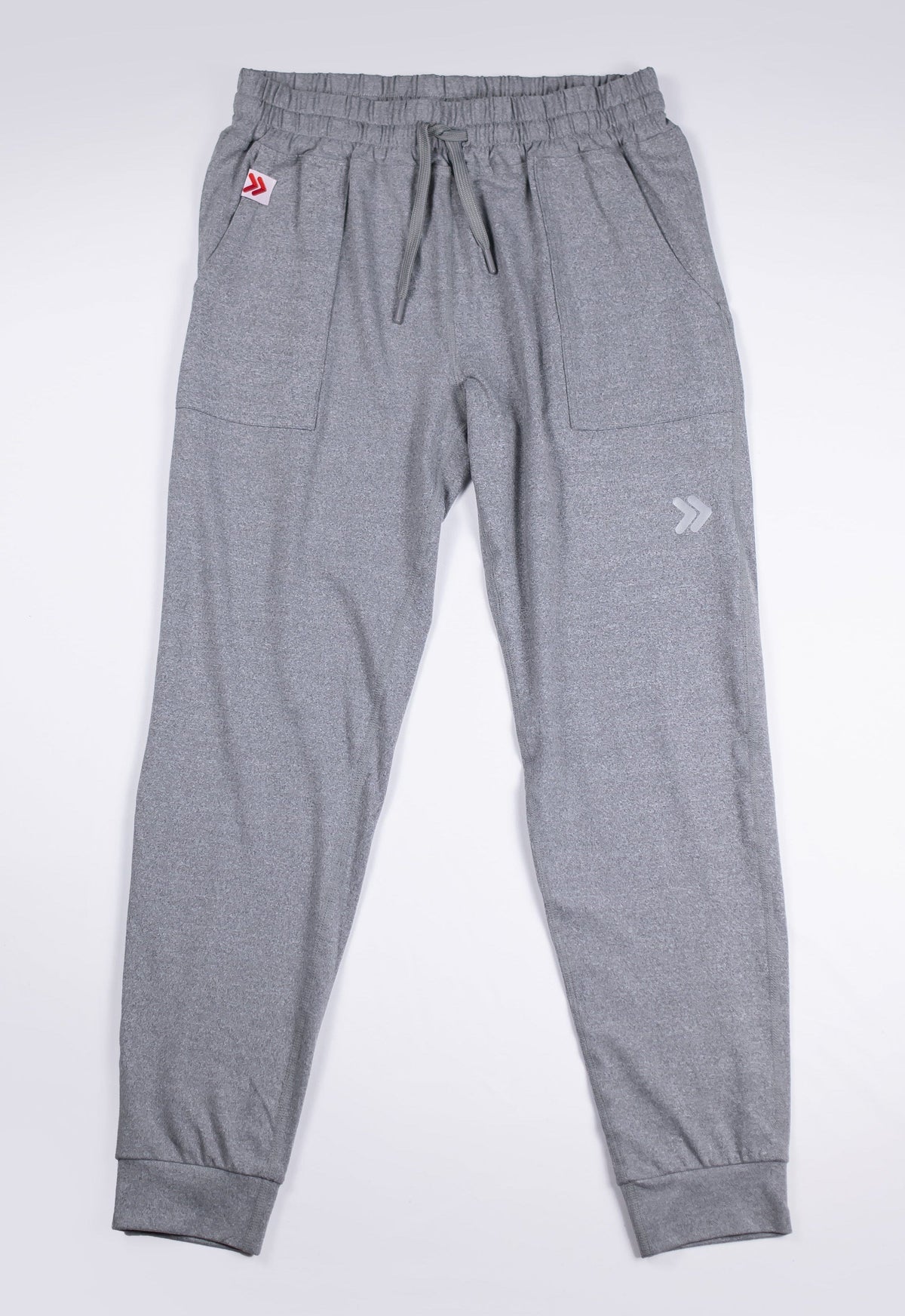 Front view of MOVE Sport Apparel women’s Essential Joggers in Grey, showing drawstring waist, pockets and ankle cuffs.