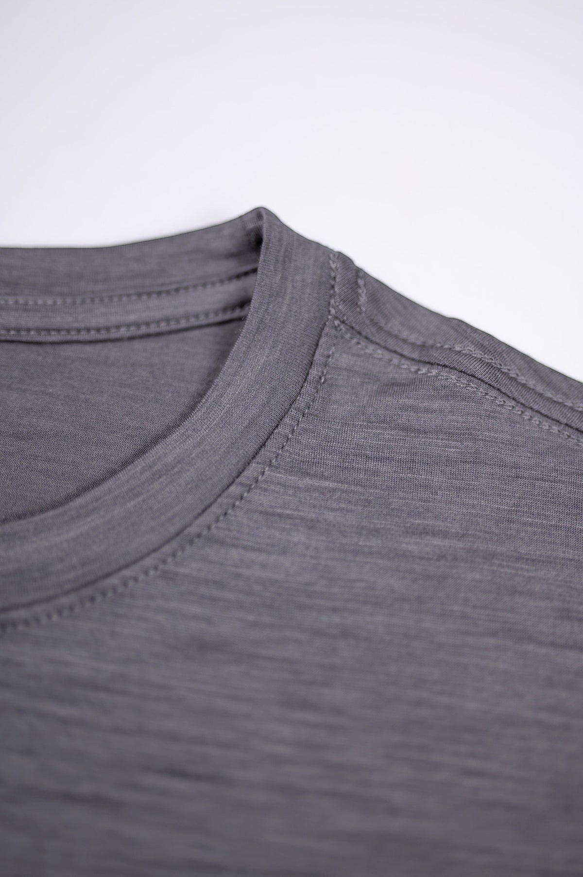 MOVE Sport Apparel women’s Merino Short Sleeve T-Shirt: Close view of the Granite Gray Merino shirt collar and fabric.