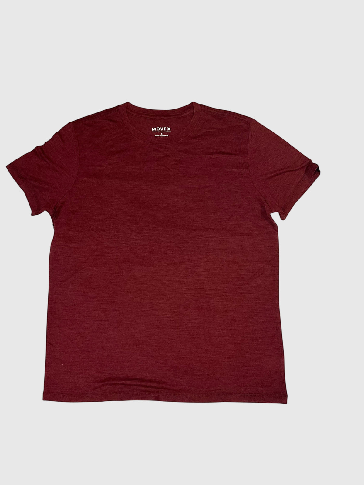 MOVE Sport Apparel women’s Merino Short Sleeve T-Shirt: Front flat-lay view of Oxblood Red Merino Short Sleeve T-Shirt.