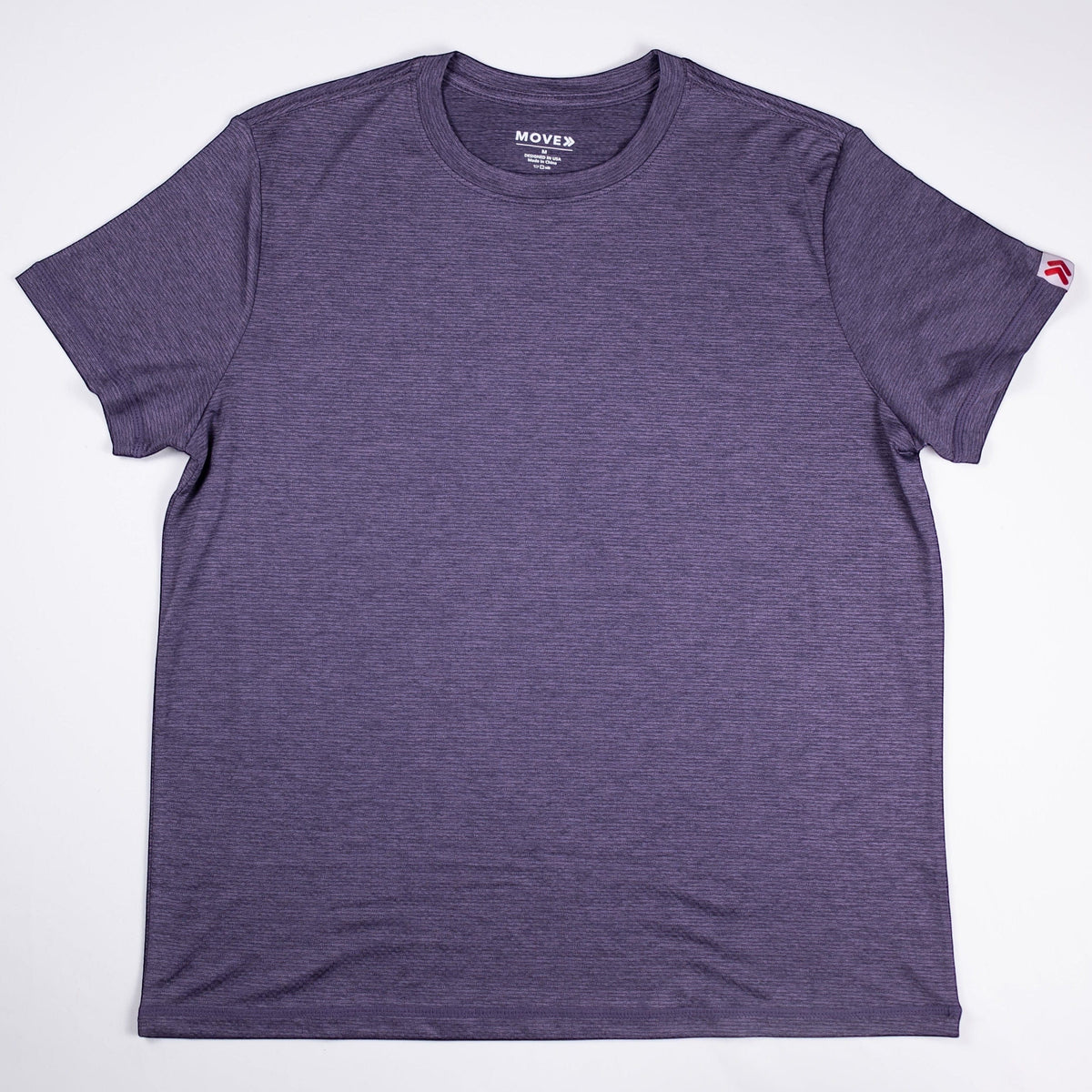 Gothic Grape MOVE Sport Apparel women’s LuxDry T-shirt shown flat with its original sleeve tab.