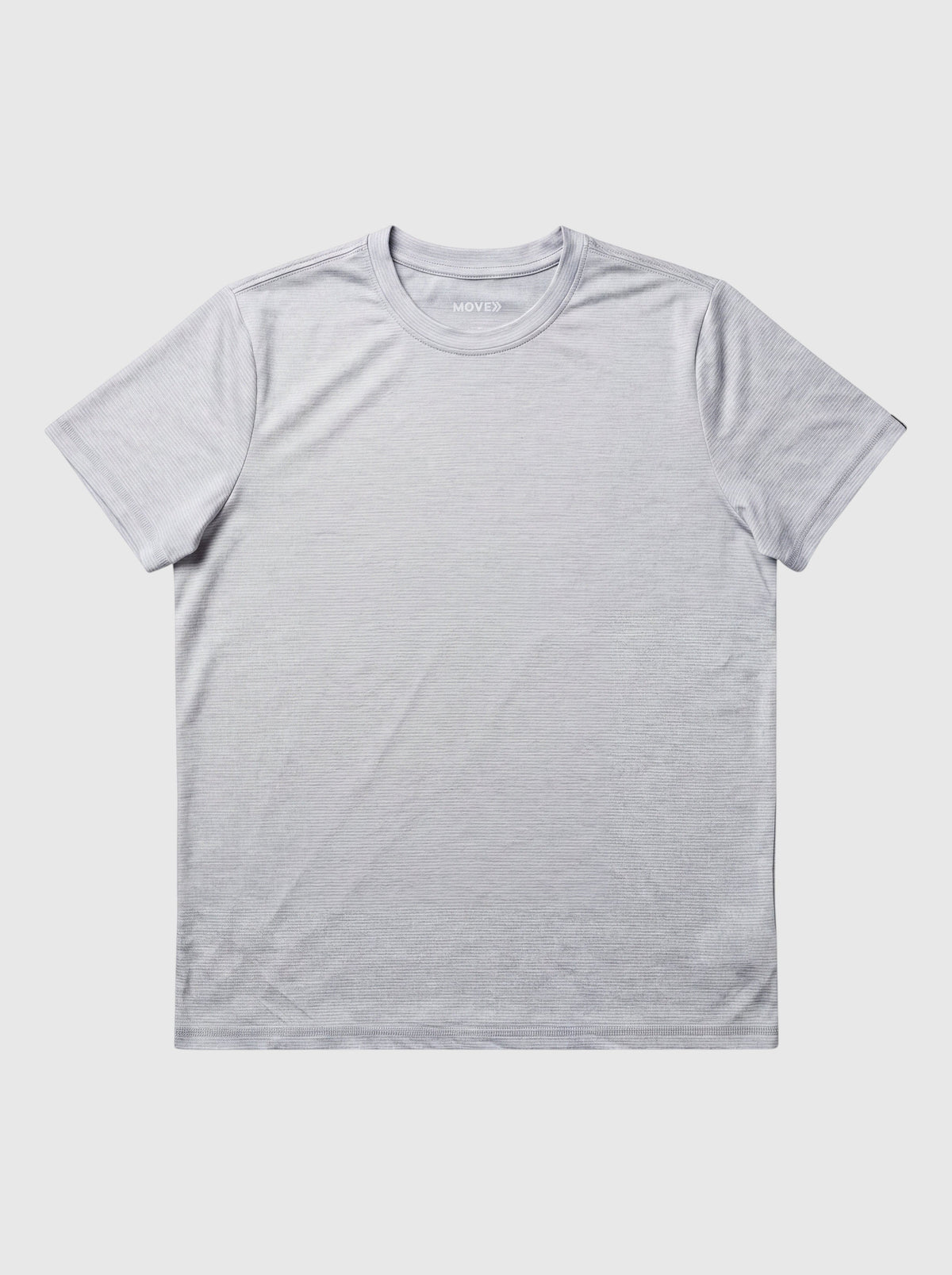 Light grey MOVE Sport Apparel women’s LuxDry T-shirt shown flat.