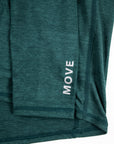 Close view of the cuff and MOVE lettering on the MOVE Sport Apparel Women’s Essential Quarter Zip in Pine Grove.