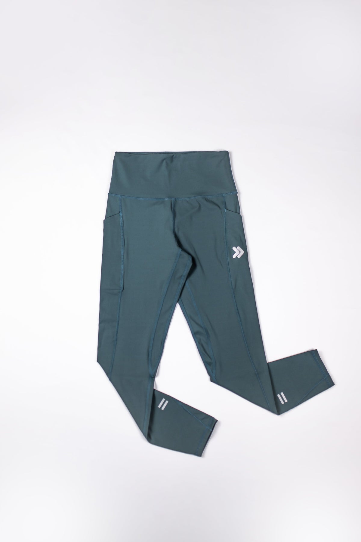 MOVE Sport Apparel women’s 25-Inch Running Tights: Balsam Green tights shown from the front.