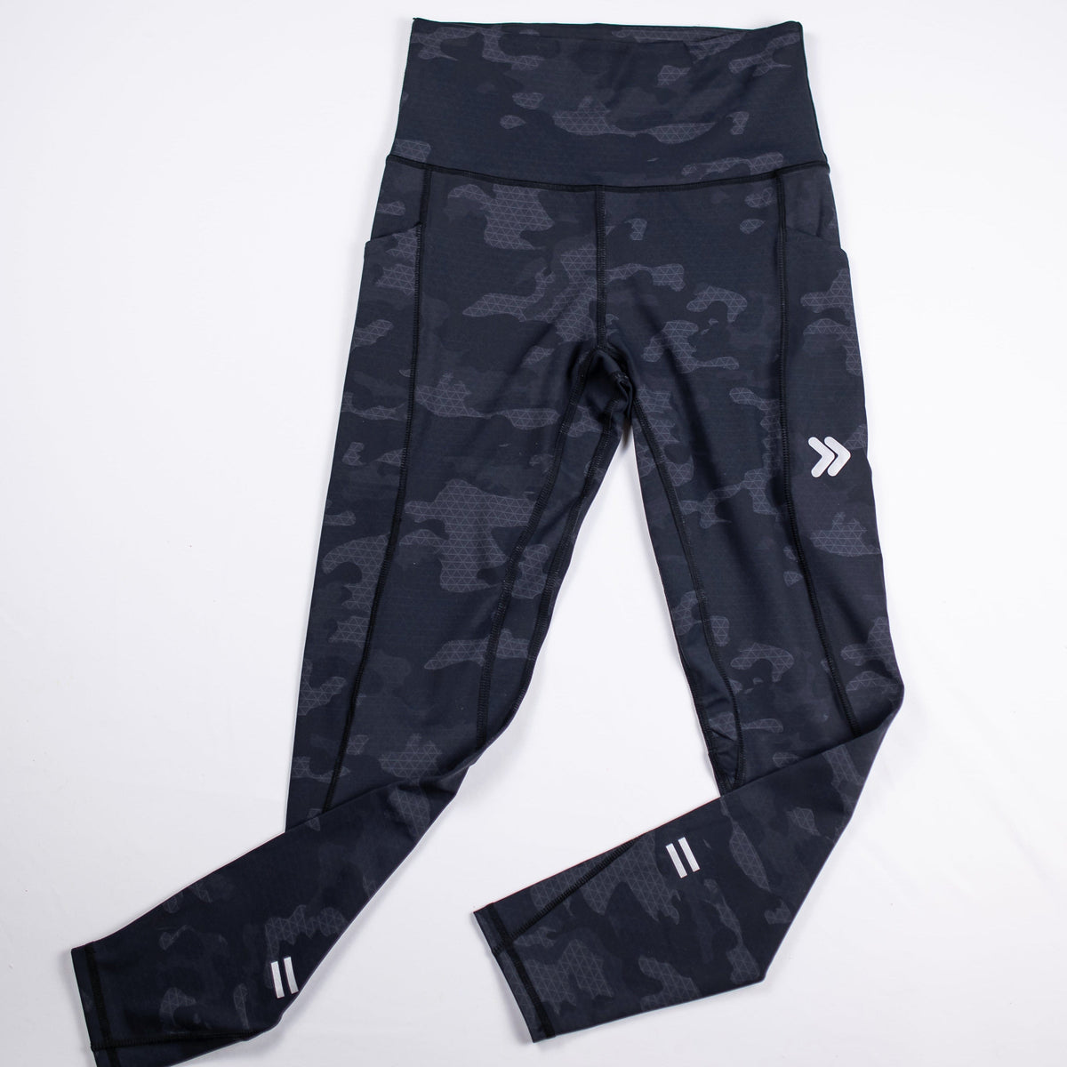 MOVE Sport Apparel women’s 25-Inch Running Tights in Black Camouflage shown flat with original thigh chevrons and ankle markings.