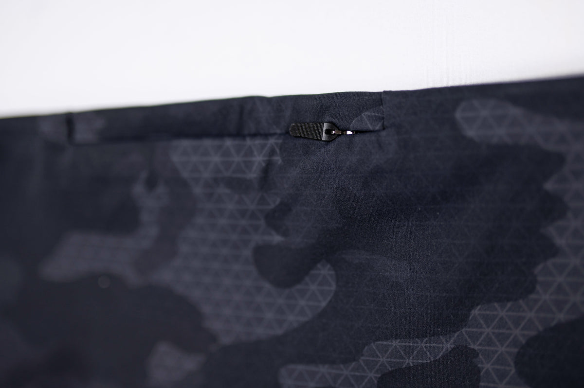 Inner waistband detail on MOVE Sport Apparel women’s 25-Inch Running Tights in Black Camouflage.