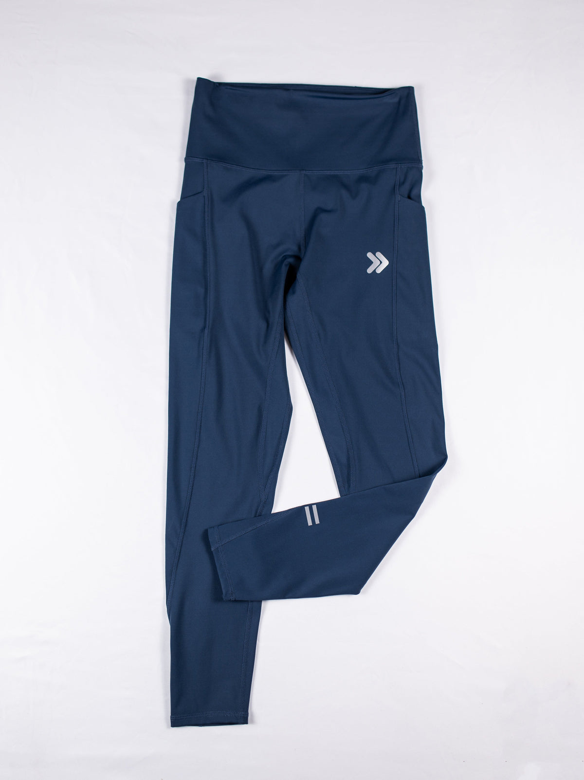MOVE Sport Apparel women’s 25-Inch Running Tights: Pageant blue tights shown flat with original thigh chevrons and ankle bars.