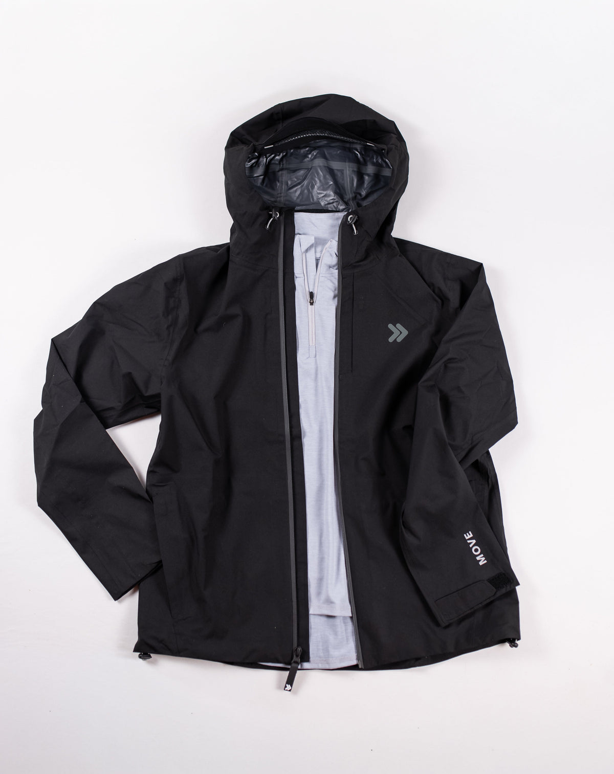 Original full-front view of the black MOVE Sport Apparel women’s waterproof jacket with hood and full zipper.