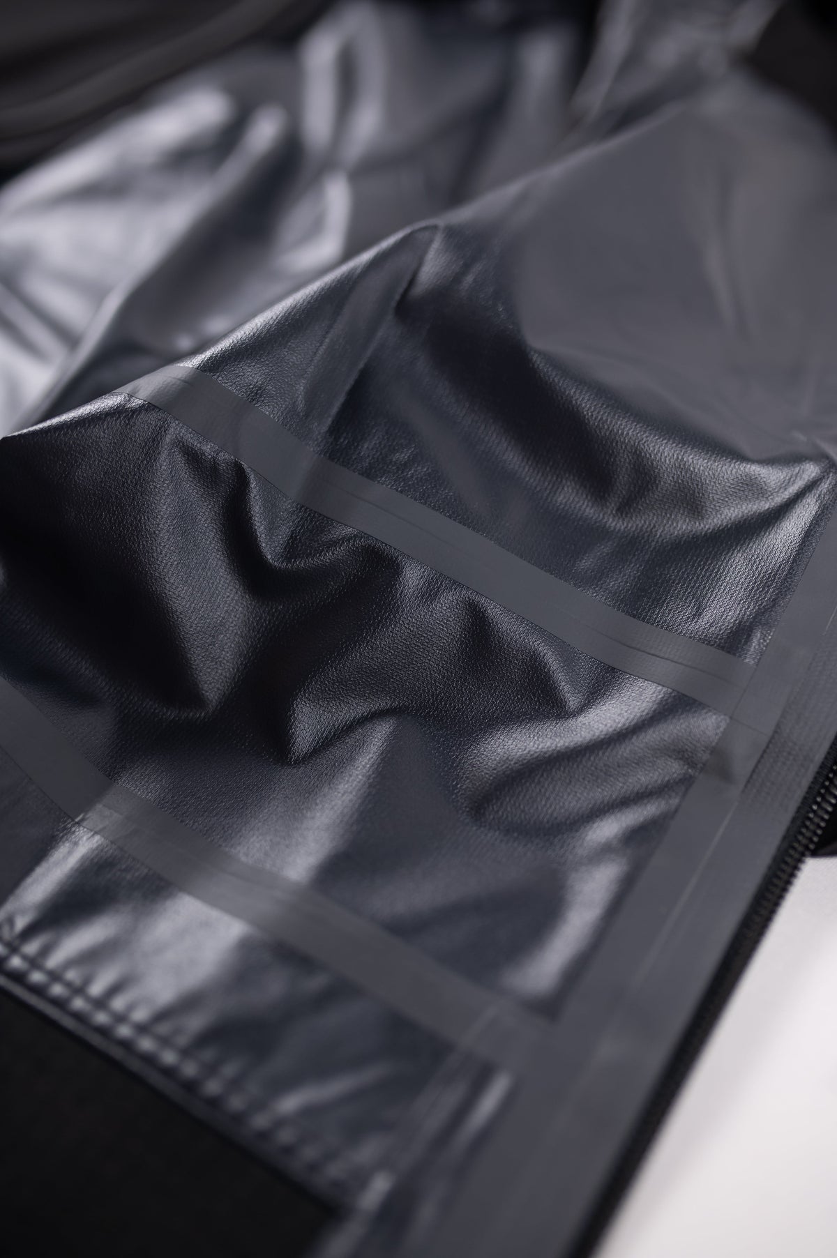Original MOVE Sport Apparel women’s waterproof jacket construction detail.