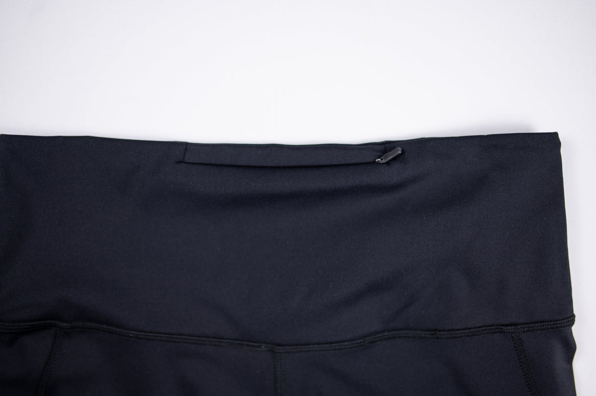 MOVE Sport Apparel women’s Biker Shorts: Close view of the broad waistband and seams on Black biker shorts.