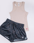 Crystal Gray MOVE Sport Apparel Women’s FlexRib Full Length Tank arranged with black running shorts.