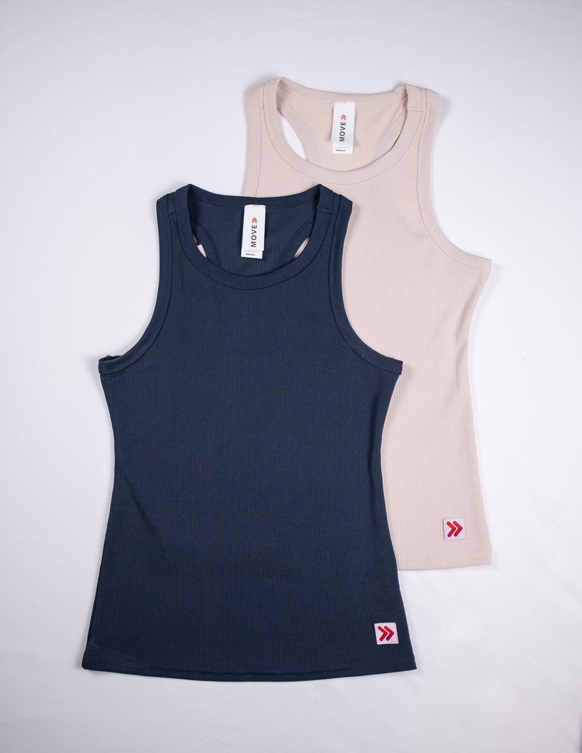 India Ink and Crystal Gray MOVE Sport Apparel Women’s FlexRib Full Length Tanks arranged together.