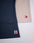 Ribbed fabric and hem tabs on India Ink and Crystal Gray MOVE Sport Apparel Women’s FlexRib Full Length Tanks.