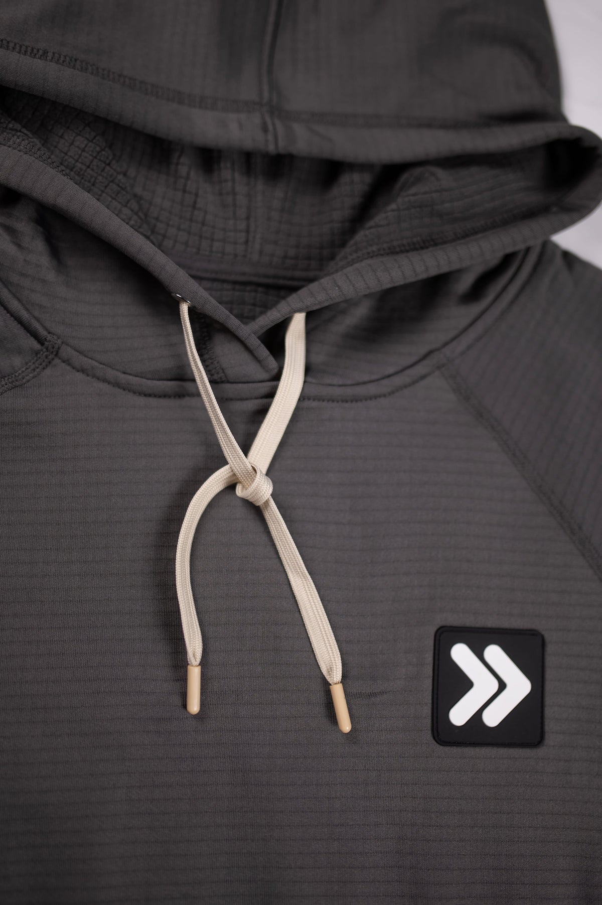 MOVE sport apparel charcoal grey waffle-knit pullover hoodie with adjustable hood, contrasting drawstrings, and logo