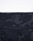 High waistband detail on MOVE Sport Apparel women’s 25-Inch Running Tights in Black Camouflage.