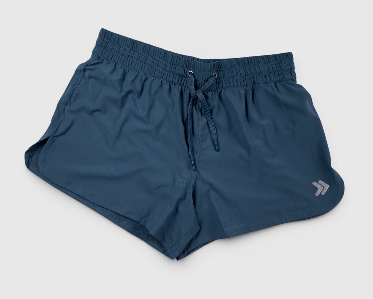 Front view of MOVE Sport Apparel women’s running shorts in Blue Mirage.