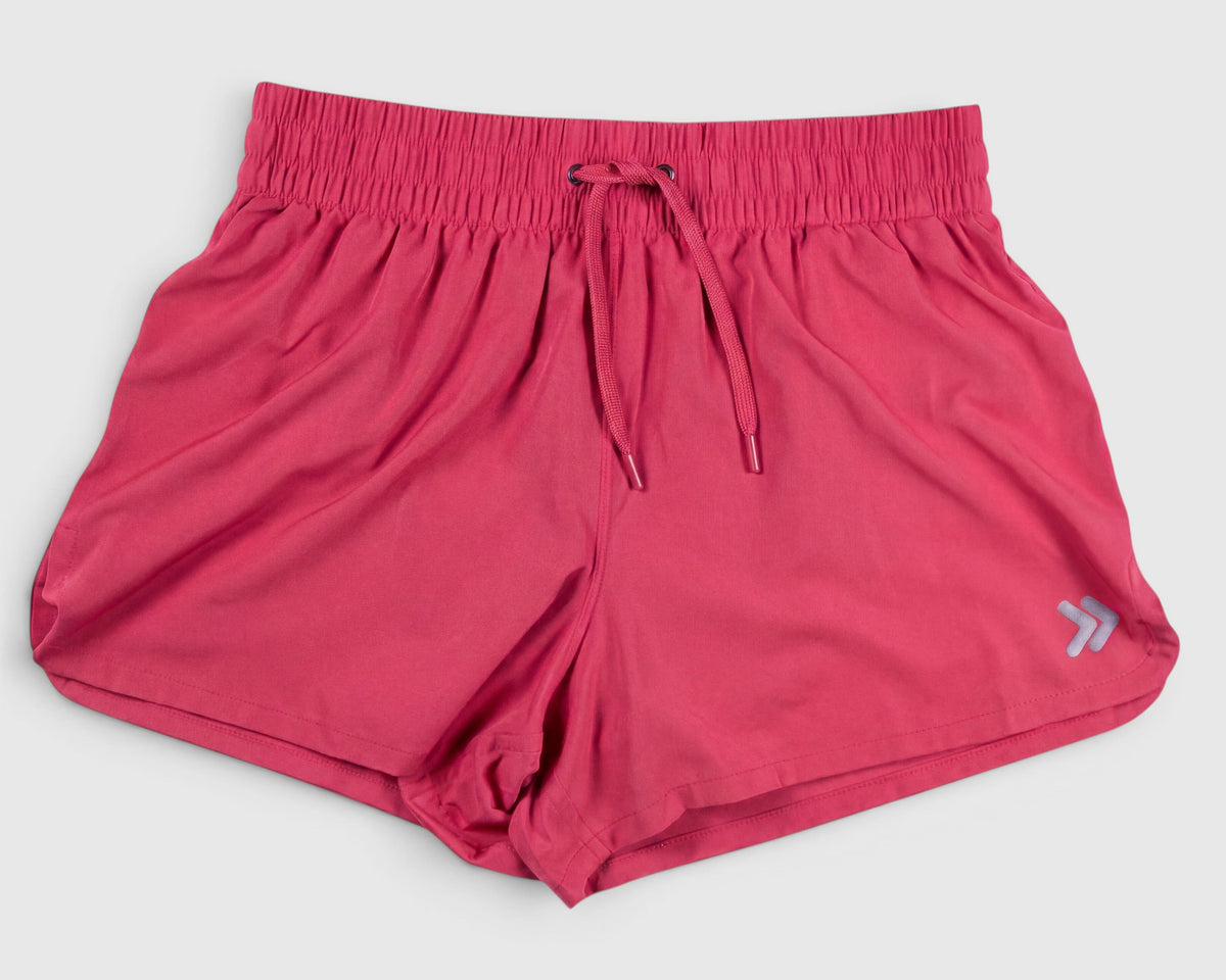 Front view of MOVE Sport Apparel women’s running shorts in Paradise Pink.