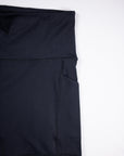 MOVE Sport Apparel women’s Biker Shorts: Close view of the side pocket and seams on Black biker shorts.