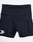 Rear flat-lay view of black MOVE Sport Apparel Women’s Biker Shorts with the waistband zipper and silver chevrons near the back hem.