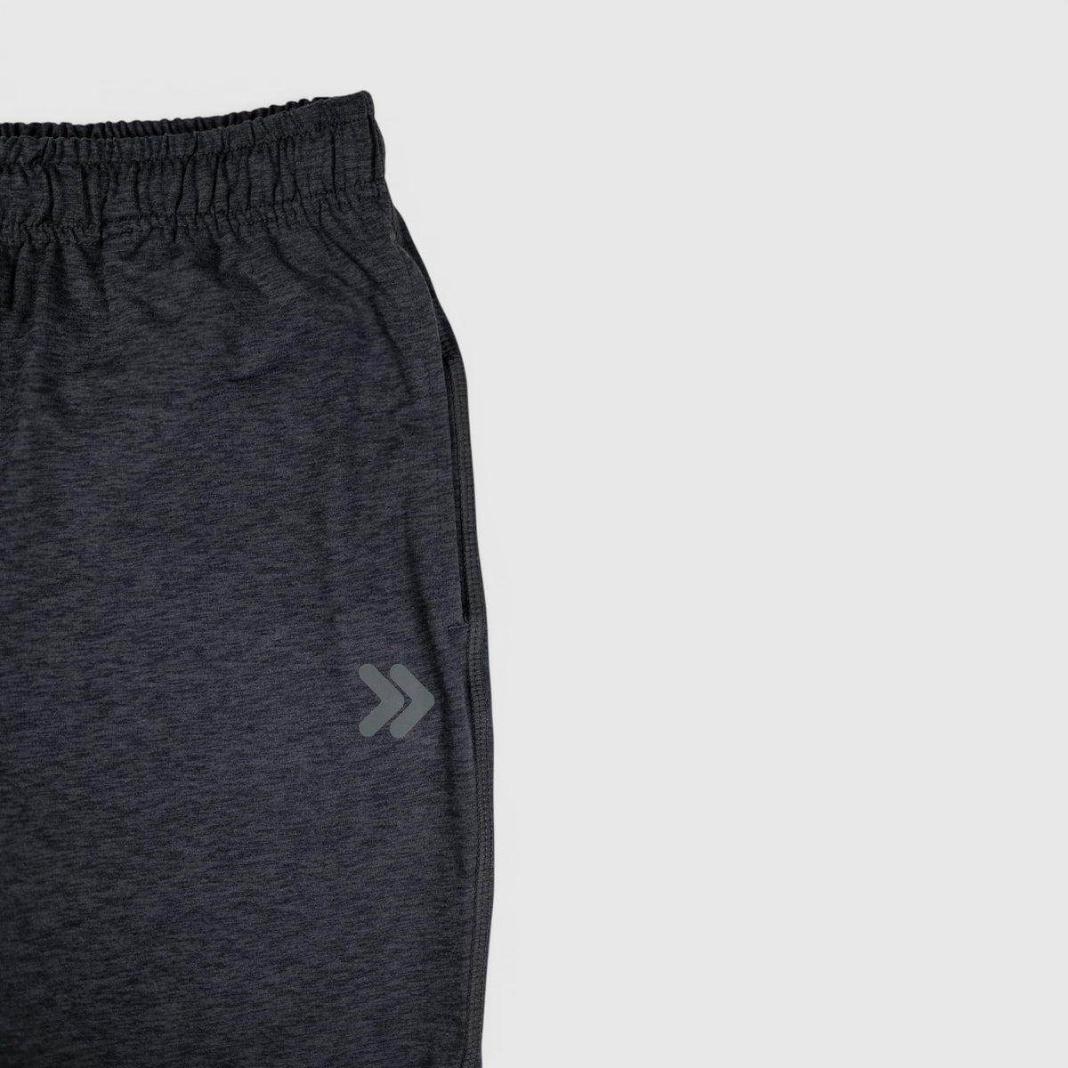 Close view of the original thigh embellishment on MOVE Sport Apparel Women’s Essential Jogger Black Label in Black.
