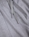 Close-up of the grey Essential Joggers drawstring and fabric.
