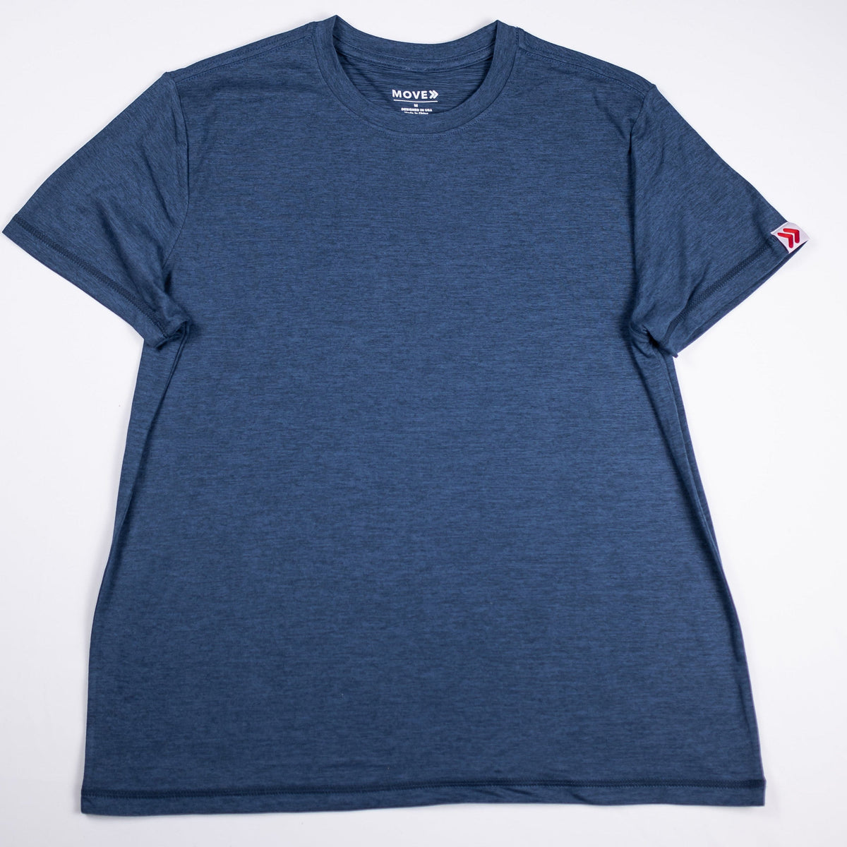 Pageant blue MOVE Sport Apparel women’s Essential Short Sleeve T-shirt, front view showing the heathered fabric, crew neckline and small red-and-white sleeve tag.