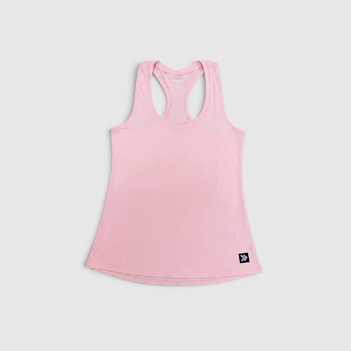 Front view of the MOVE Sport Apparel Women’s Racerback Performance Tank Top in Heather Pink with its original lower hem embellishment.