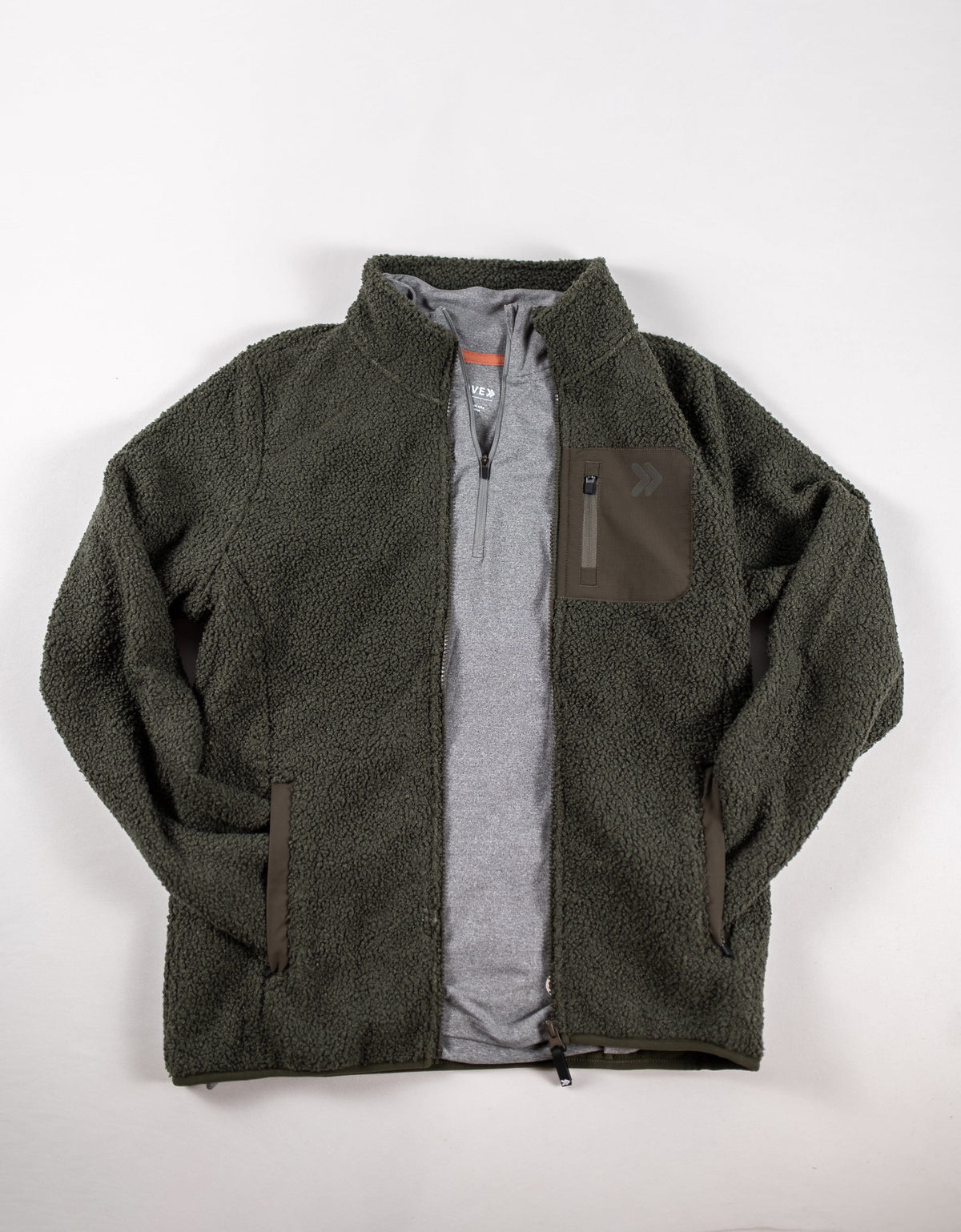 Smokey Olive MOVE Sport Apparel women’s Sherpa jacket showing stand collar, full zipper and contrast chest pocket.