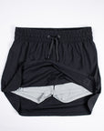 Black MOVE Sport Apparel women’s Skort lifted to show its inner shorts.
