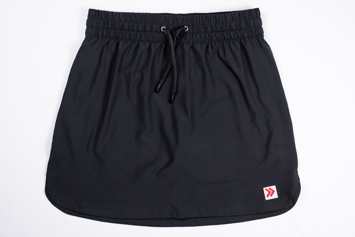 Front view of MOVE Sport Apparel women’s Skort in Black.