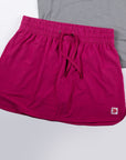 Front view of MOVE Sport Apparel women’s Skort in Vivacious pink.