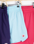 Purple, Atomizer pale blue and pink MOVE Sport Apparel women’s Skorts hanging together with original hem tabs.