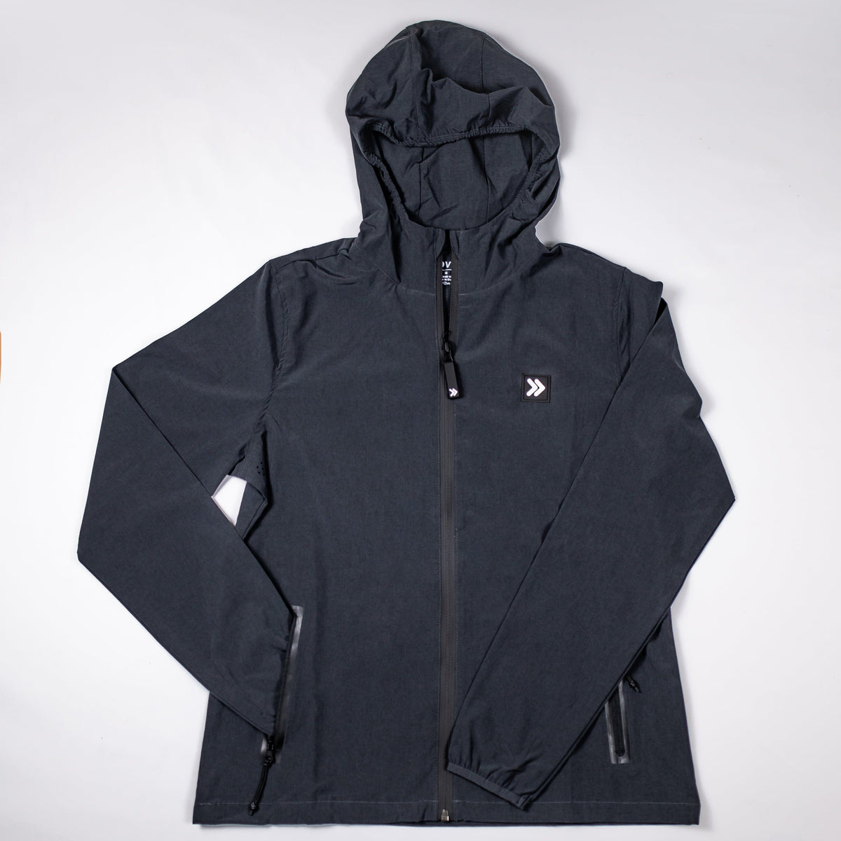 Black MOVE Sport Apparel women’s Soft Shell Jacket, front view showing the hood, full-front zipper, chest emblem and side pockets.